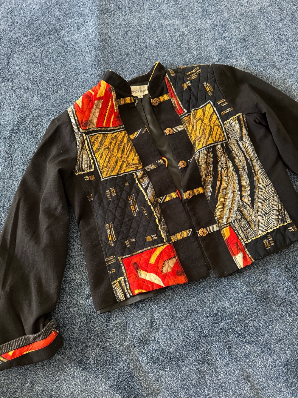 Vintage Patchwork Black Jacket with Red & Gold Accents